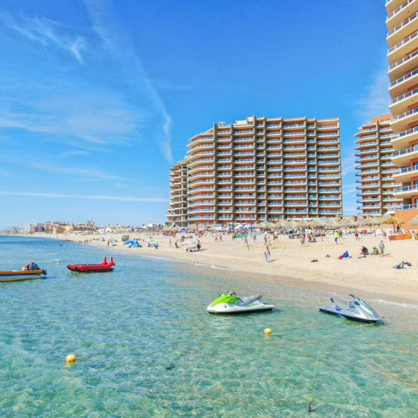 Jet skis on the water near the beach